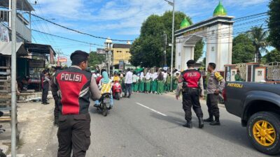 Unit Patmor Sat Samapta Polres Dompu Laksanakan Patroli Dialogis dan Pengamanan Pawai, Situasi Kamtibmas Tetap Kondusif