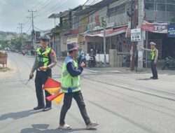 Polsek Gangga Gelar Kegiatan “Rawan Siang” di Jalan Raya Gangga – Bayan