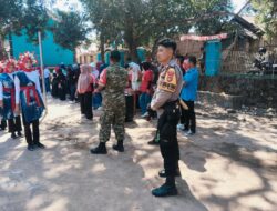 Semarak Peringatan HUT RI Ke-81 Polsek Madapangga Gelar Patroli Pengamanan Lomba Gerak Jalan Unik Tingkat Desa Dena