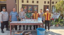 Polsek Kempo Musnahkan 48 Botol Miras Hasil Operasi, Libatkan Pemerintah Desa dan Tokoh Masyarakat